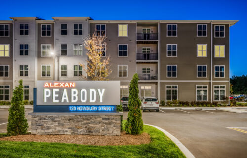 Alexan Peabody Exterior showing property signage